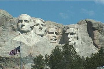 rushmore with flag